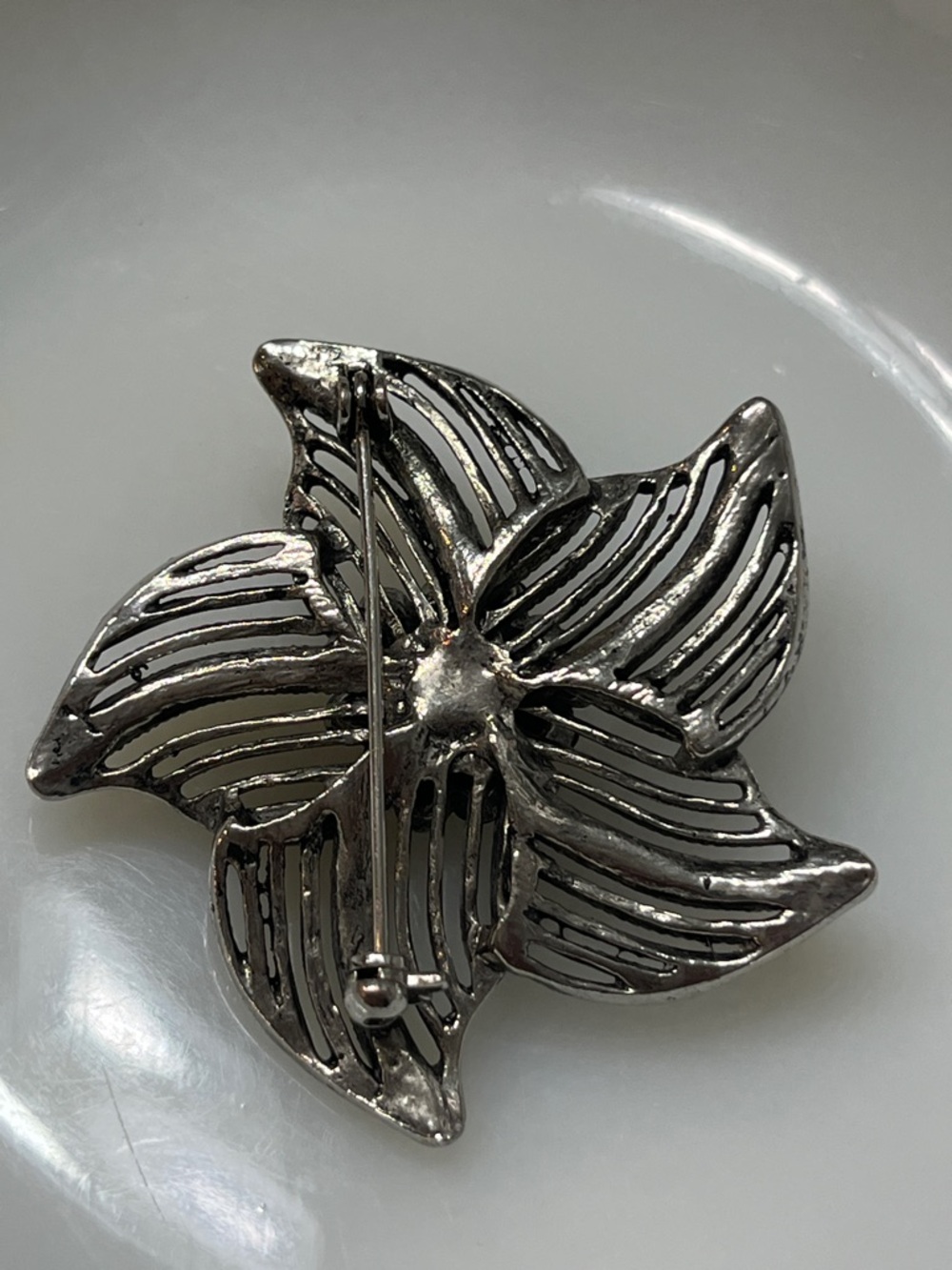 Vintage, Pinwheel Brooch in a Silver -Tone w/ Rhinestones - Picture 2 of 4